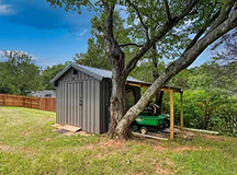 Shed with steel siding and overhang
